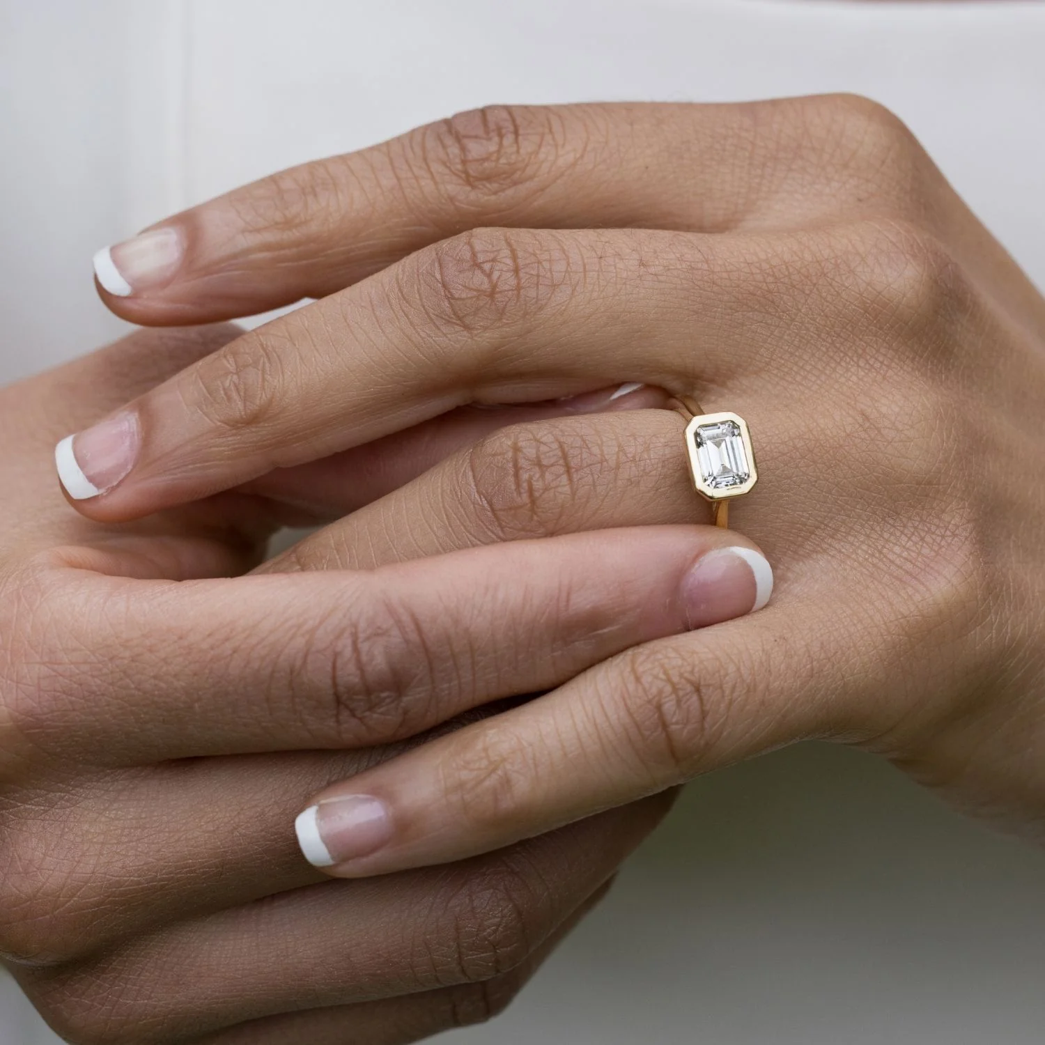 The Adeline - Hidden Halo Emerald Cut Moissanite Engagement Ring with Bezel Setting - Image 4