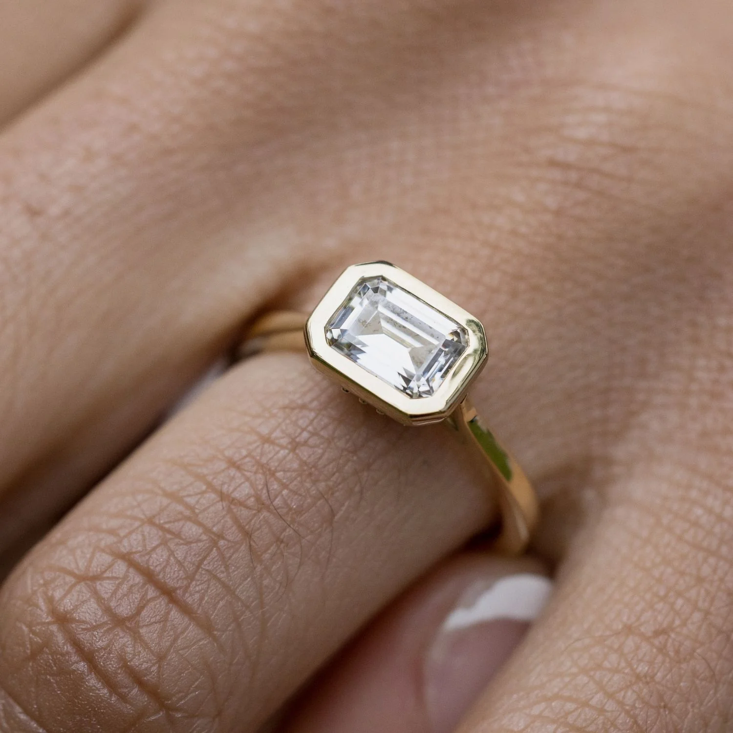 The Adeline - Hidden Halo Emerald Cut Moissanite Engagement Ring with Bezel Setting - Image 6