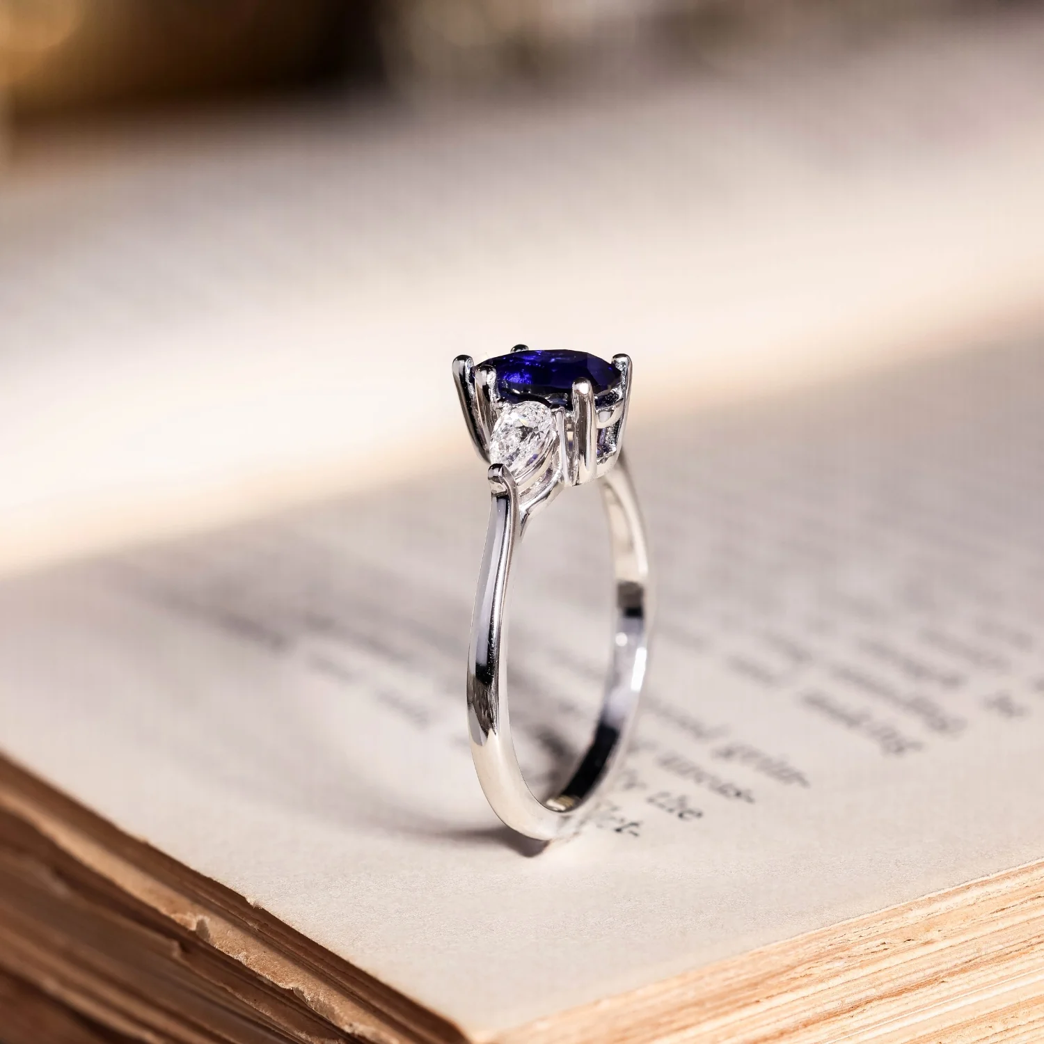The Diana - Blue Sapphire Pear Cut Three Stone Engagement Ring with Diamond Accents - Image 10