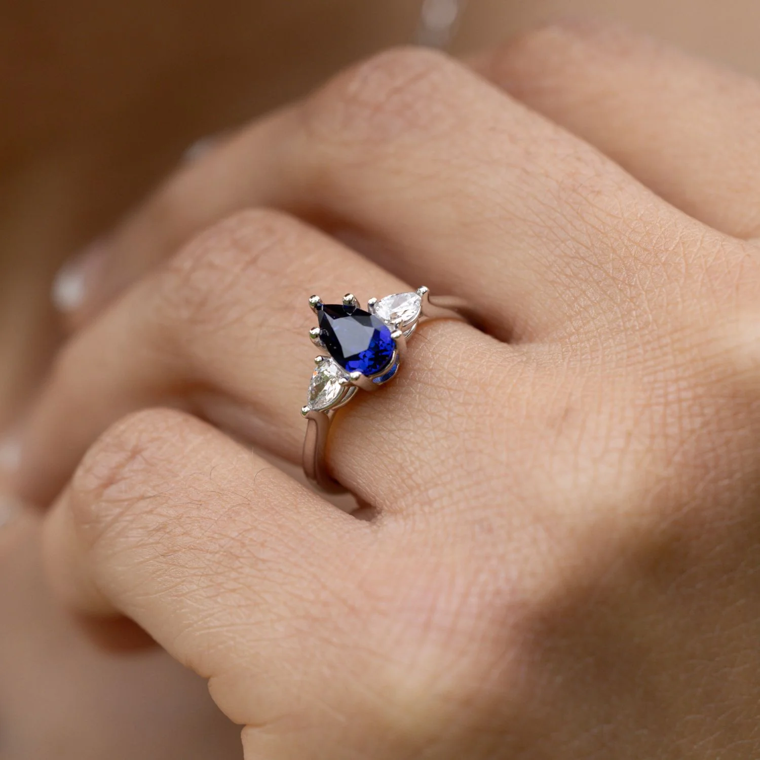 The Diana - Blue Sapphire Pear Cut Three Stone Engagement Ring with Diamond Accents - Image 3