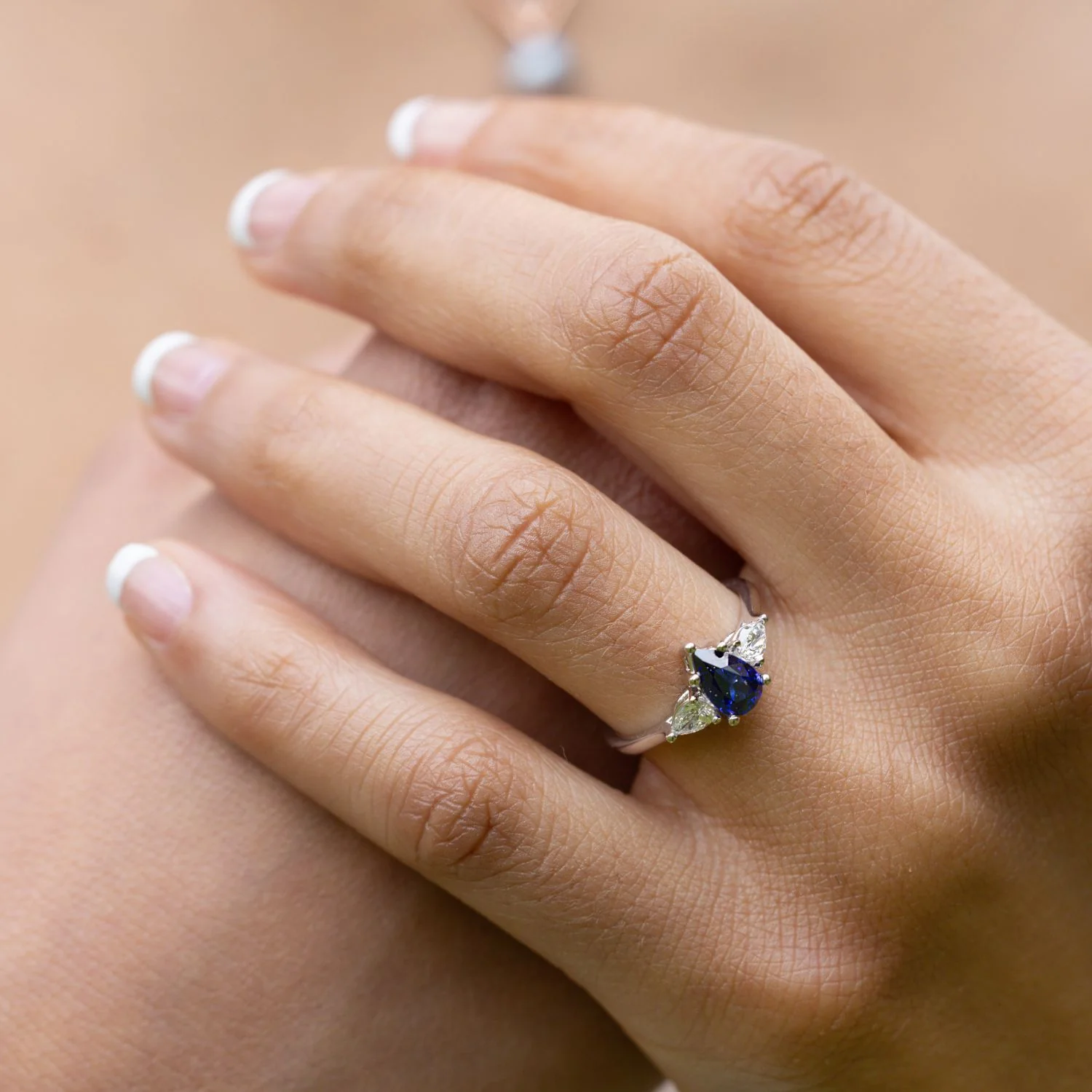 The Diana - Blue Sapphire Pear Cut Three Stone Engagement Ring with Diamond Accents - Image 5