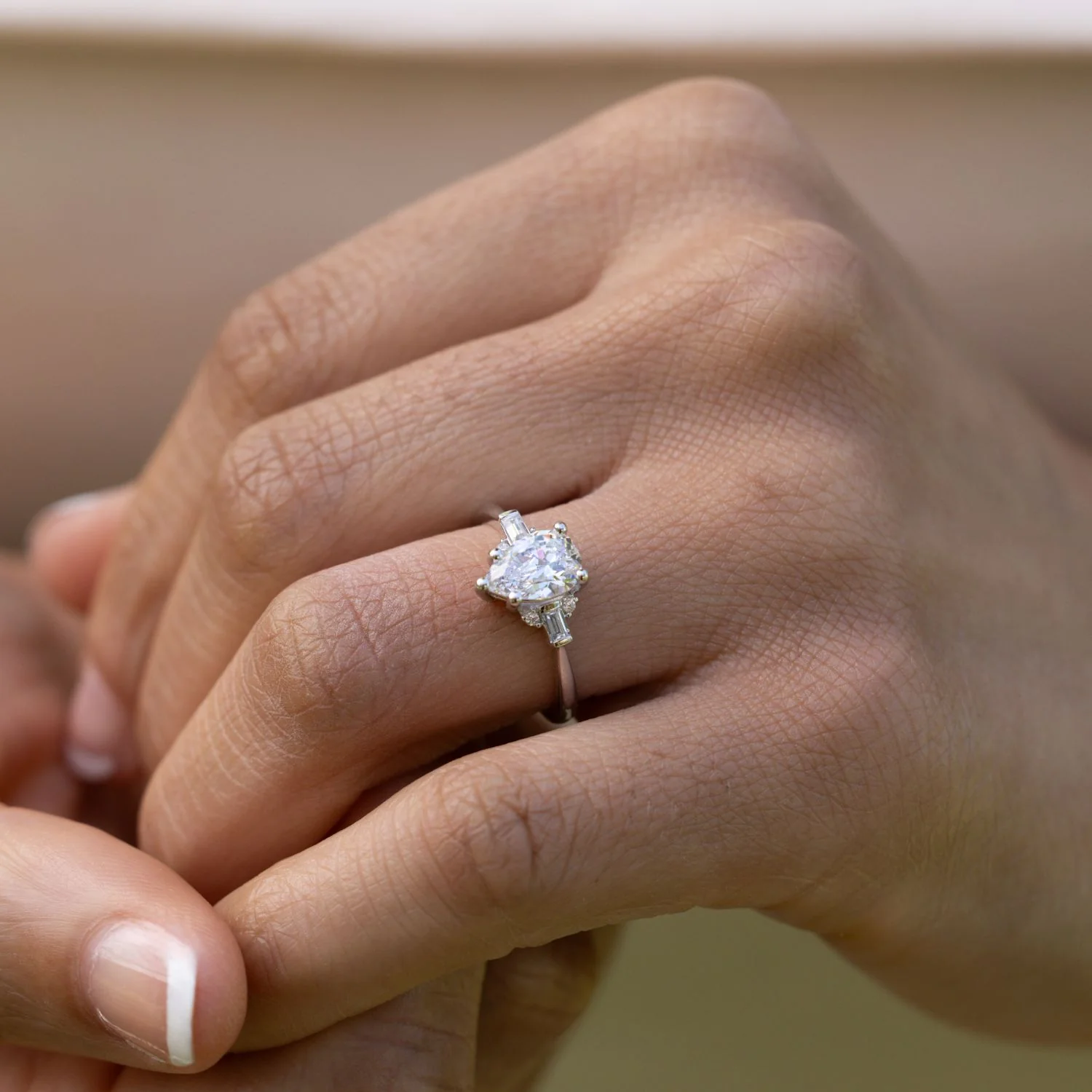The Juno - Pear-Shaped Diamond Engagement Ring with Straight Baguette and Round Diamond Accents - Image 11