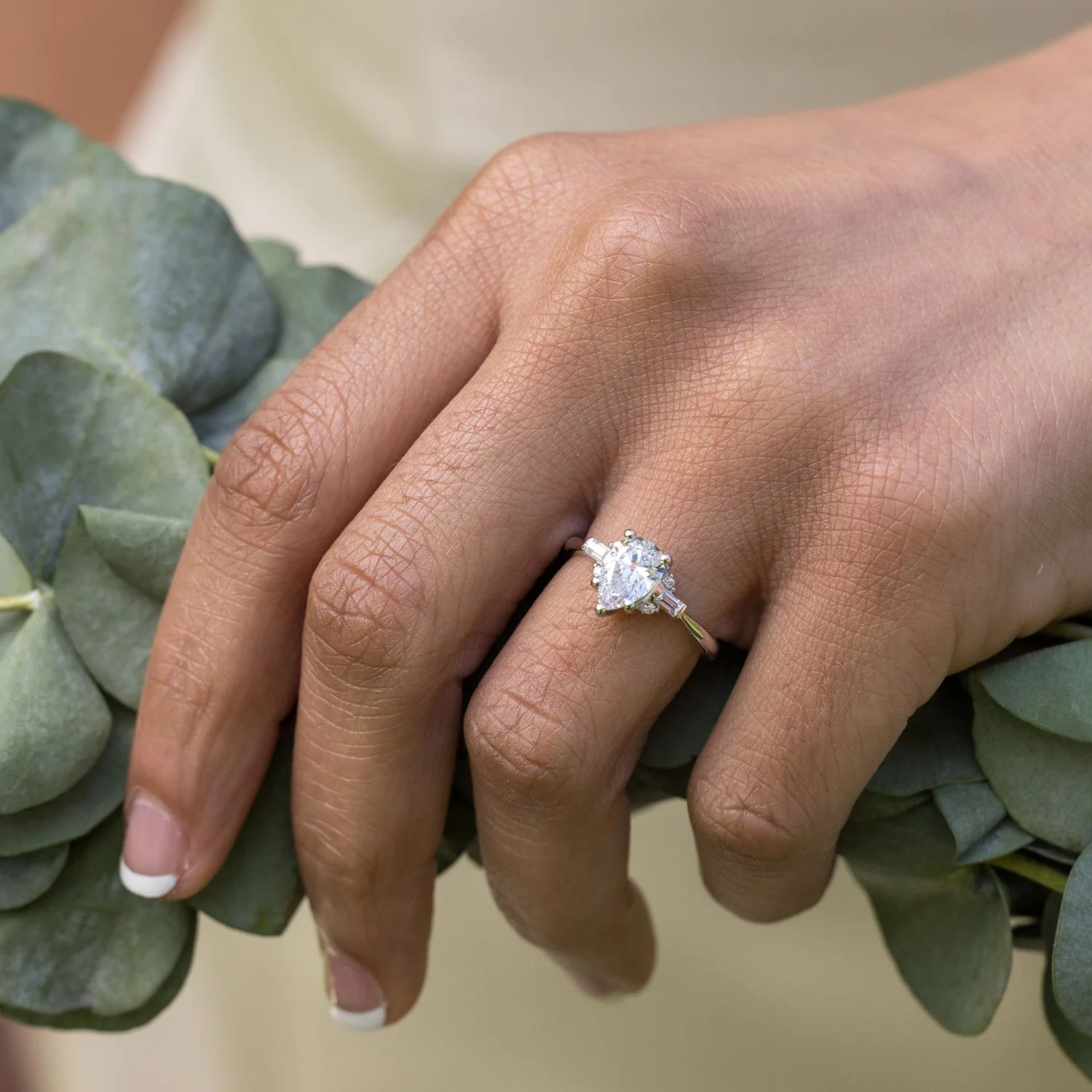 The Juno - Pear-Shaped Diamond Engagement Ring with Straight Baguette and Round Diamond Accents - Image 4