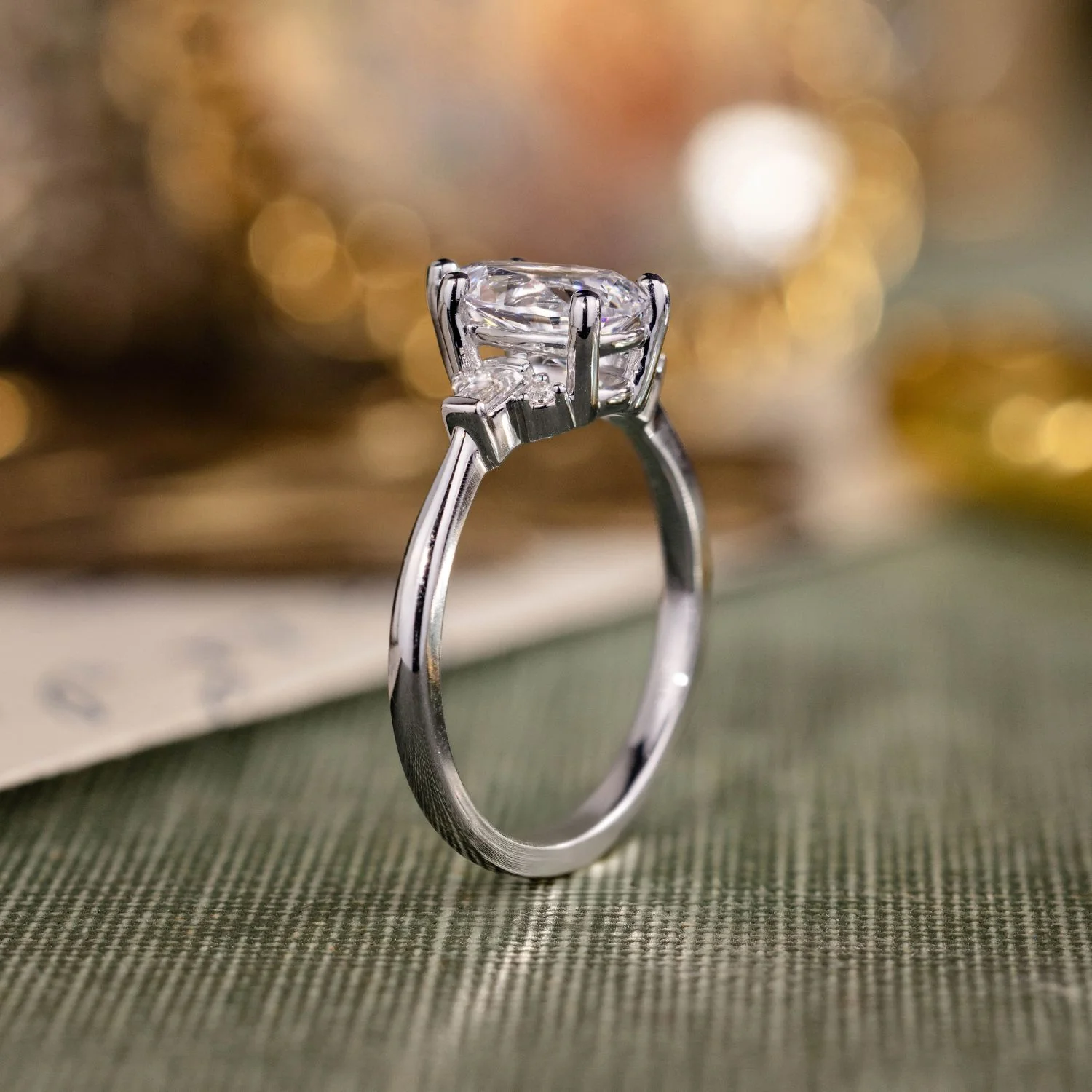 The Juno - Pear-Shaped Diamond Engagement Ring with Straight Baguette and Round Diamond Accents - Image 9