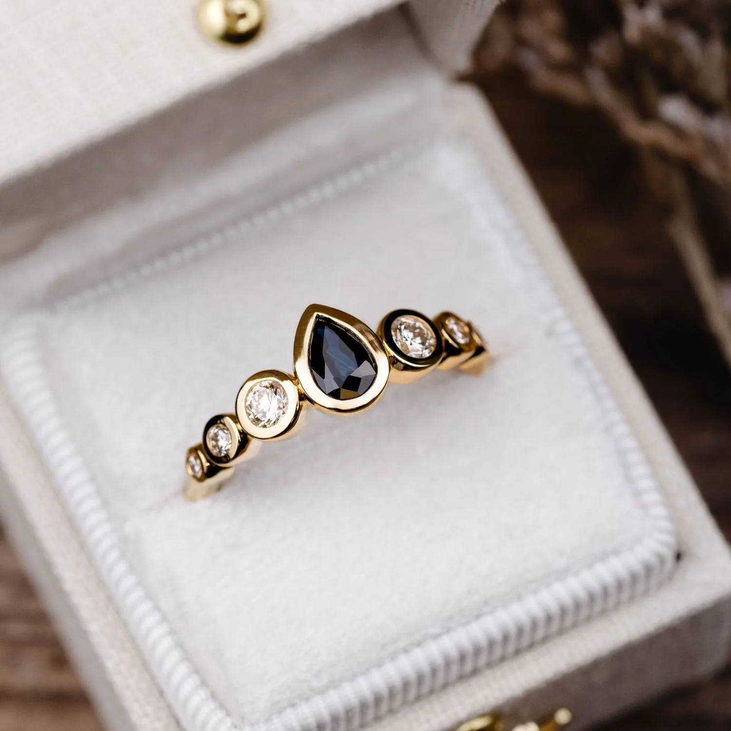 The Lyra - Bezel Set Pear Cut Blue Sapphire Engagement Ring with Diamond Accents - Image 12