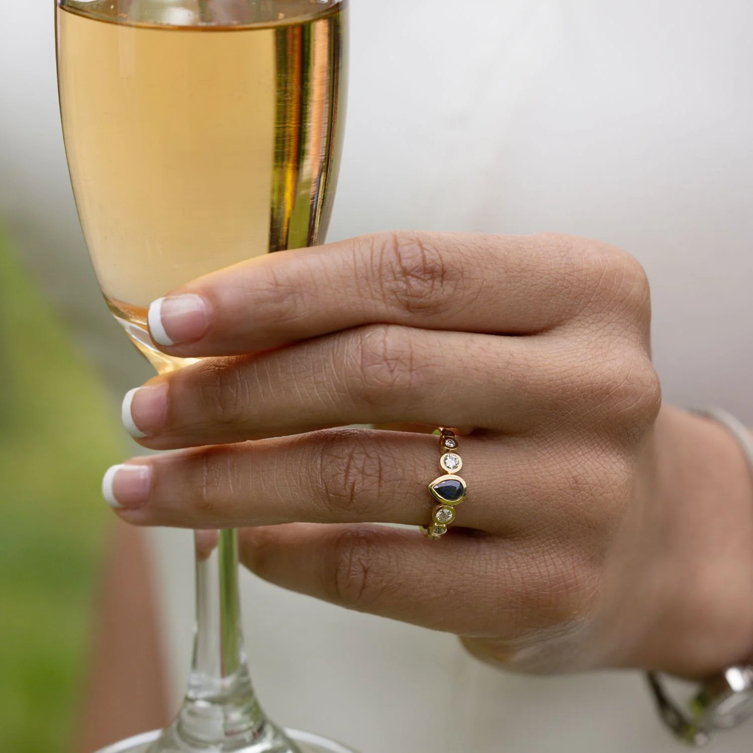 The Lyra - Bezel Set Pear Cut Blue Sapphire Engagement Ring with Diamond Accents - Image 6