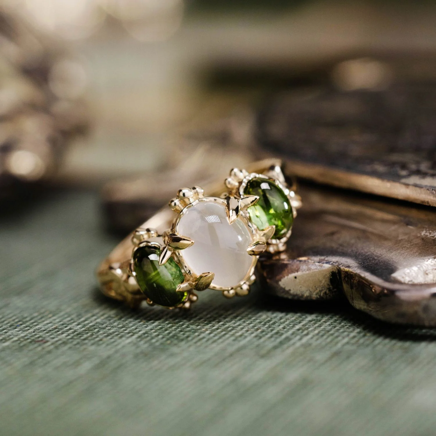 The Myzelle - Vintage-Inspired Oval Cabochon Three Stone Engagement Ring with Moonstone & Green Tourmaline - Image 7